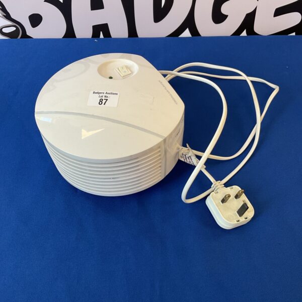 Vintage ionising air purifier for cleaner indoor air.