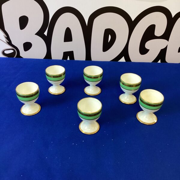 Set of six vintage Royal Paragon egg cups in pastel colours.