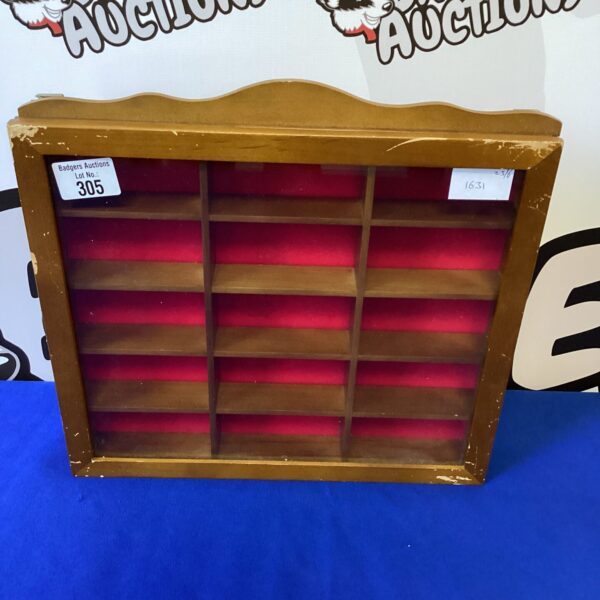 Small wooden display case for collectibles and curios.