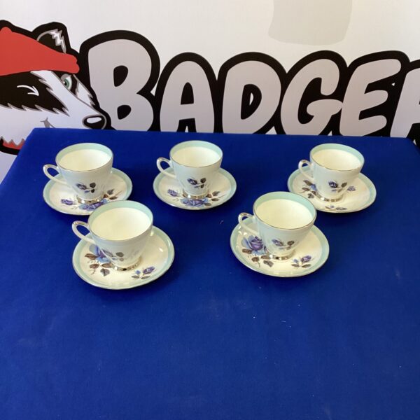 Vintage bone china tea cup and saucer with floral Windsor pattern.