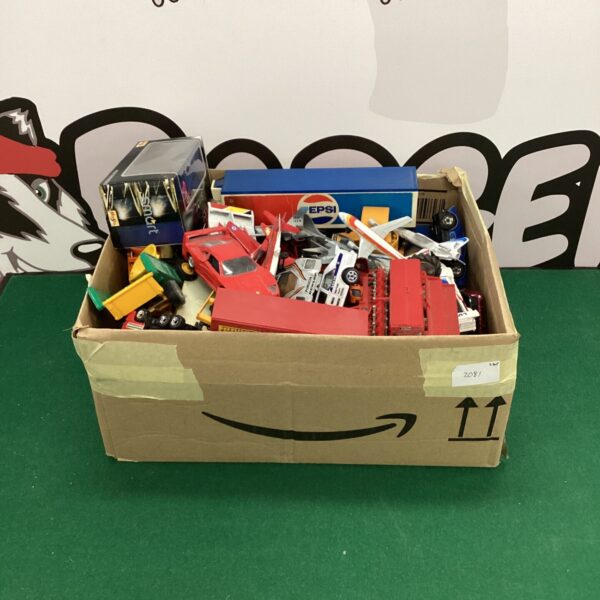 Assorted diecast model cars and planes including a Pepsi truck.