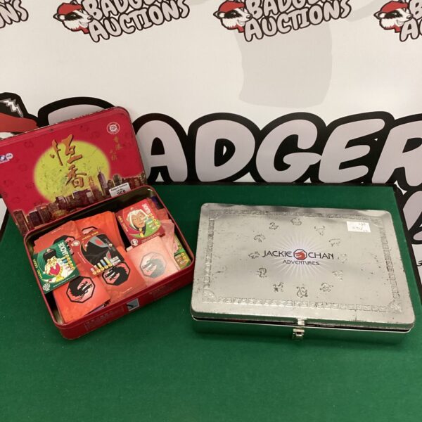 Vintage Jackie Chan Adventures game in a decorated tin.