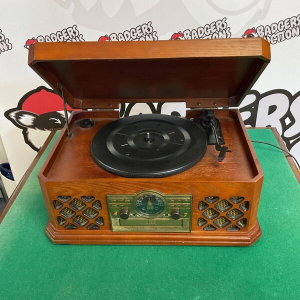 Front view of a vintage Zennox turntable record player.
