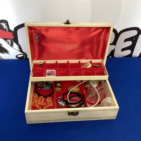 Vintage wooden jewellery box with contents, a collectable item.