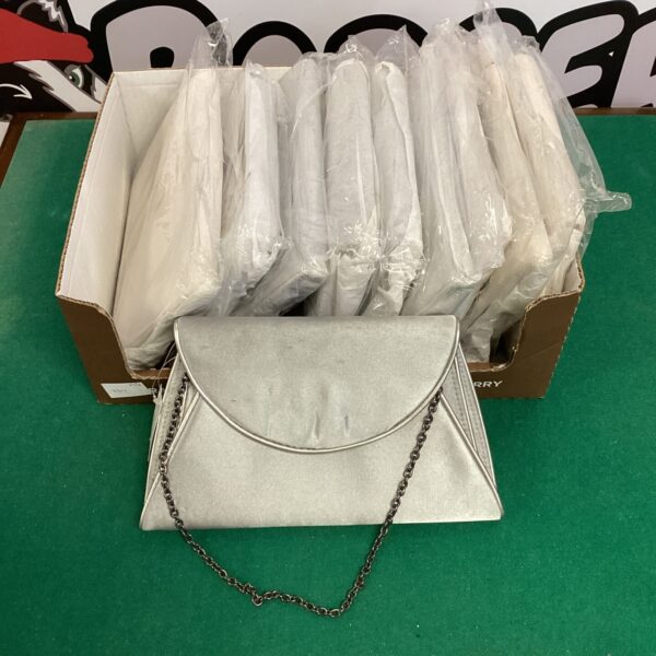 New lot of ten ladies satin clutch bags with chain straps.