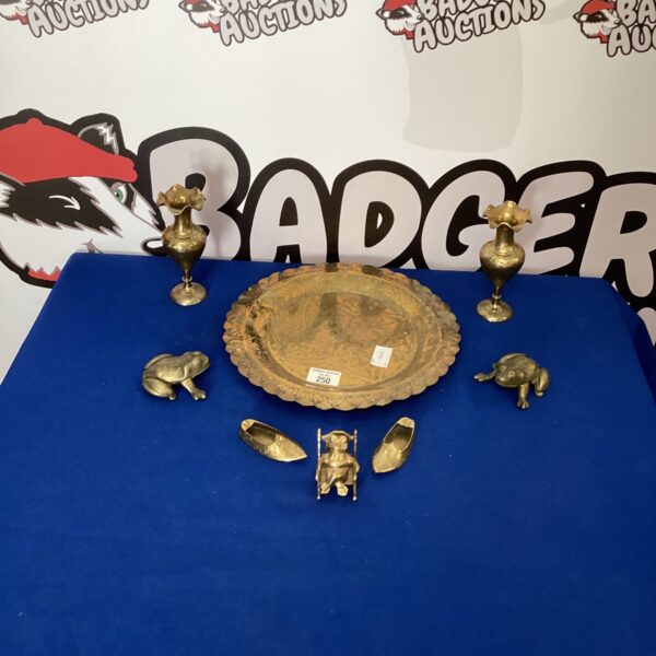 Ornate antique brass tray with floral design, a beautiful collectible.