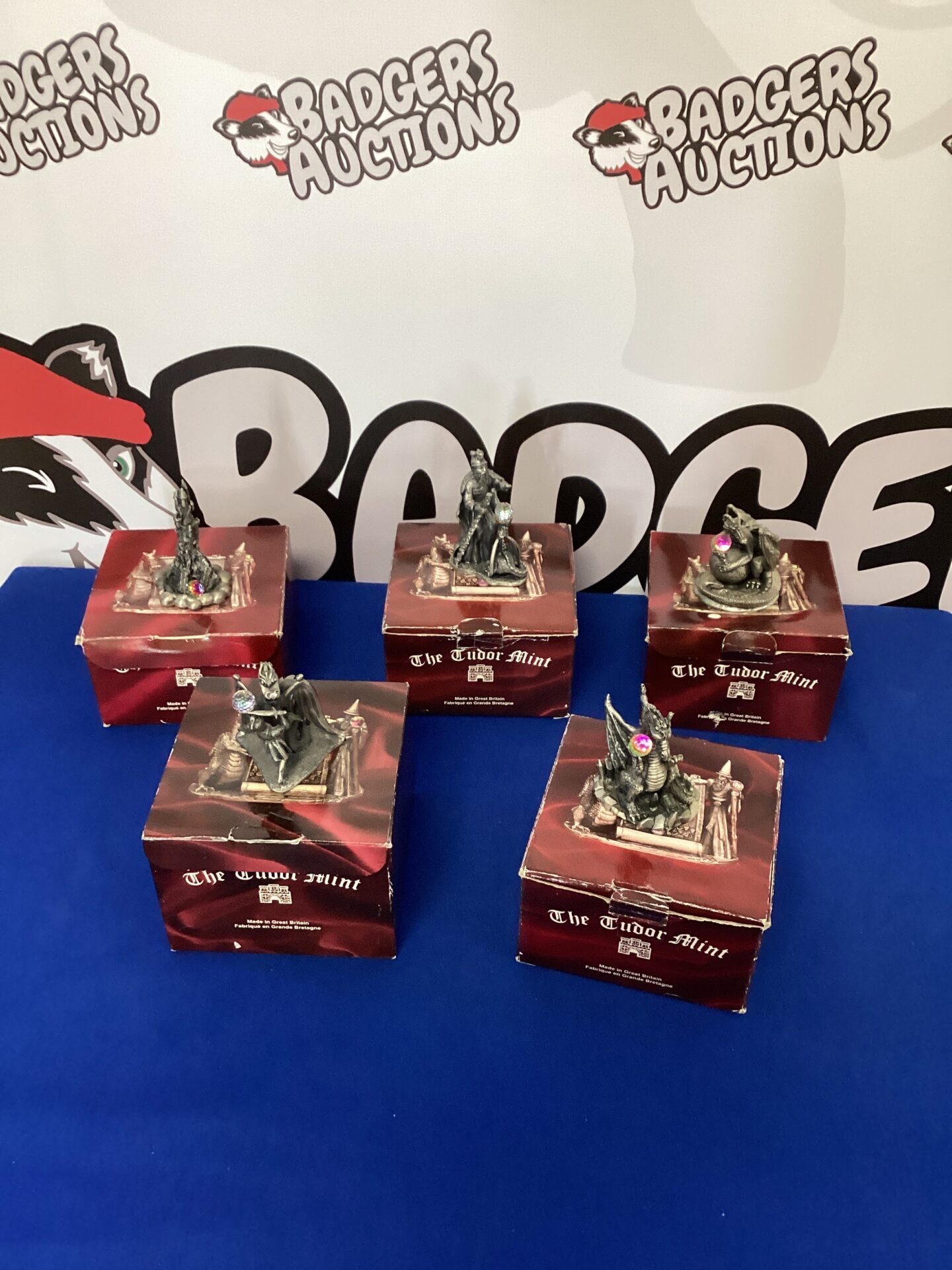 234 Five boxed Tudor Mint Myth and Magic Figurines