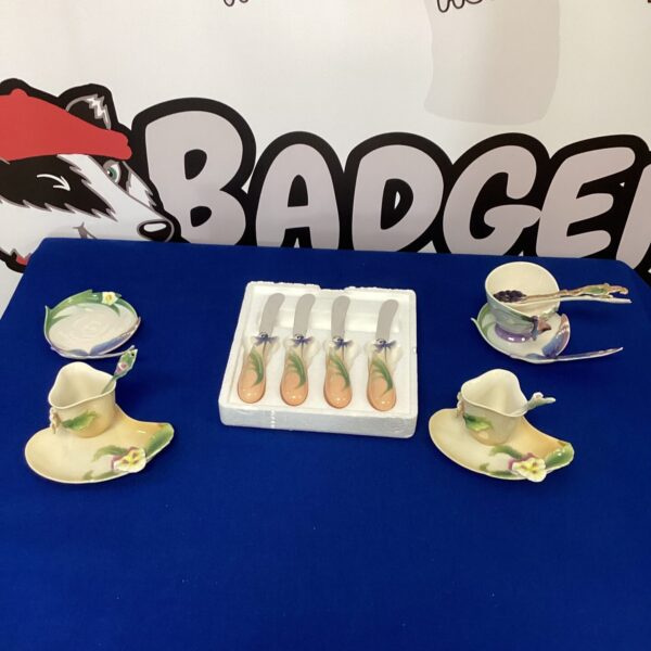 Set of six Franz porcelain knives with dragonfly designs.