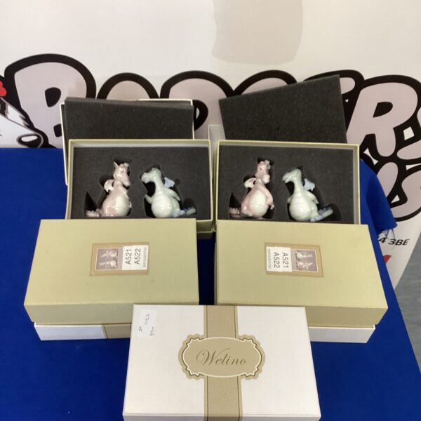 Set of Welino porcelain dragon figurines, detailed and collectible.