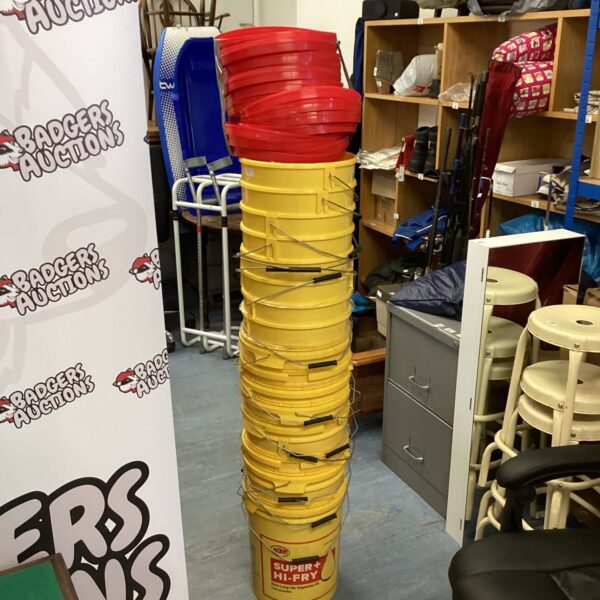 Stack of yellow 20L Super Hi-Fry buckets for storage.