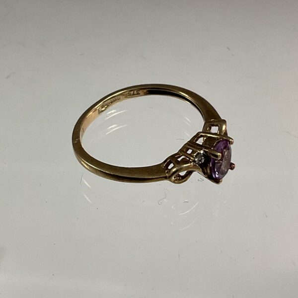 Close-up of a 9ct gold amethyst ring, size L.