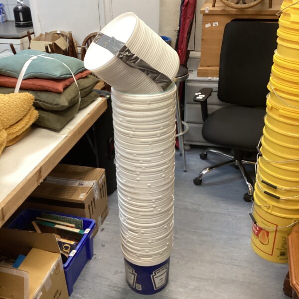 Stack of ten Heinz branded plastic buckets for storage.