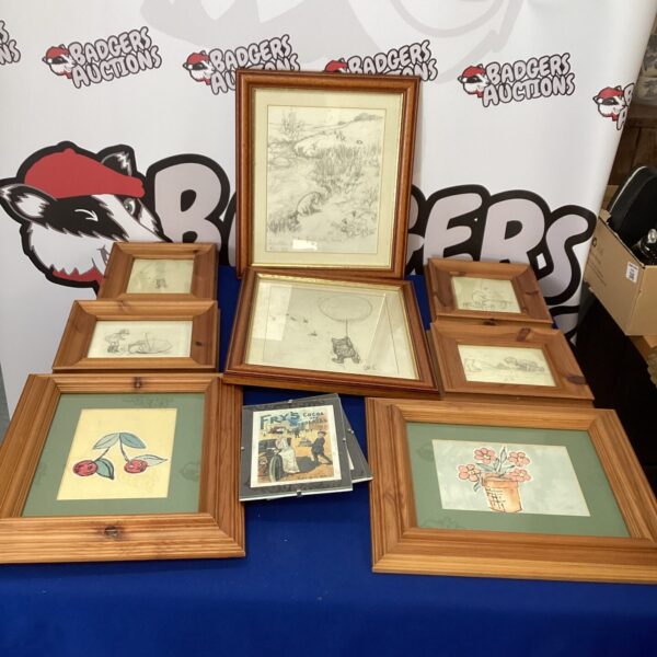 Mixed art prints including Winnie the Pooh in wooden frames.