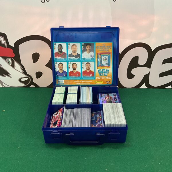 Mixed lot of Topps Match Attax football cards in a storage box.