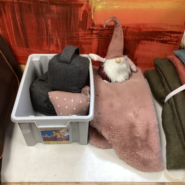 Fabric gnome door stop with pink rug in a lot of four.