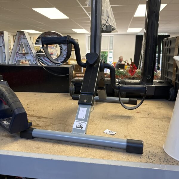 Front view of a used pedal exercise machine for home fitness.