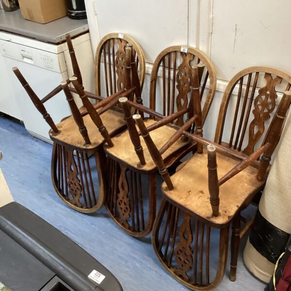 Lot of six vintage Ercol wheelback dining chairs.