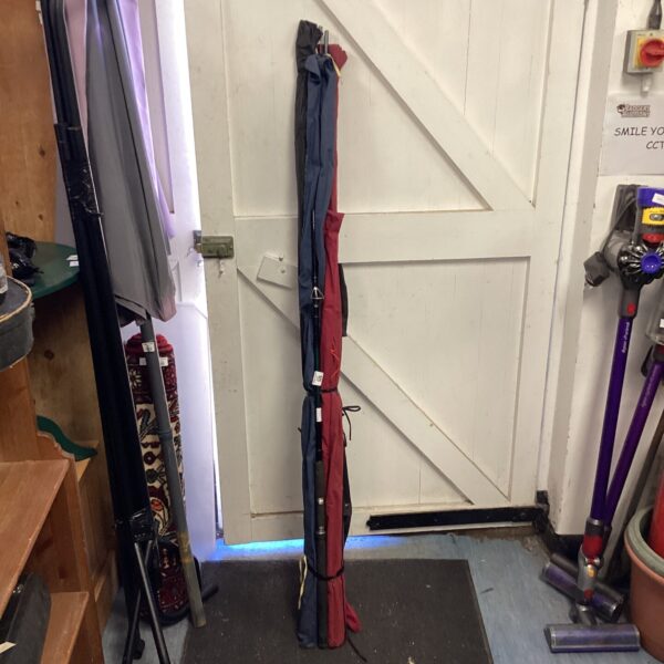 Bundle of used fishing rods for angling and collecting.