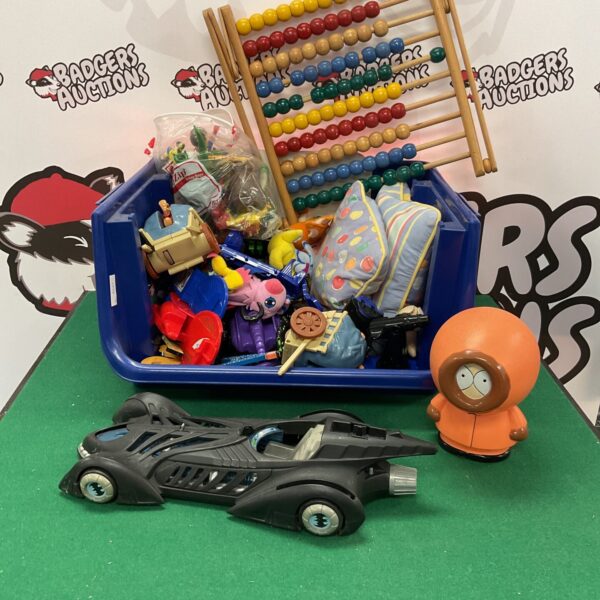 Childrens toy bundle featuring a Batmobile and South Park Kenny figure.