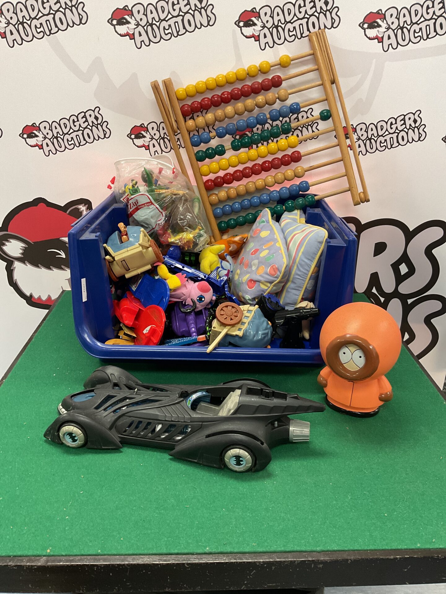 438 Box of assorted childrens toys incl. batmobile and kenny from south park
