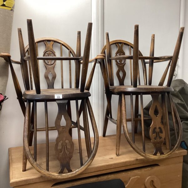 Lot of four vintage Ercol dining chairs in beech wood.