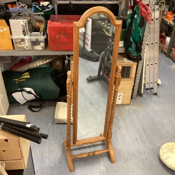 Vintage pine free-standing mirror with turned supports.