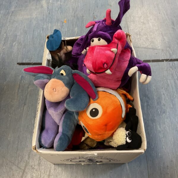 Soft toy collection featuring Nemo, Postman Pat, and Eeyore plush toys.