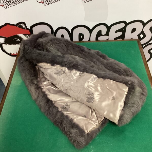 Front view of a luxurious vintage mink jacket.