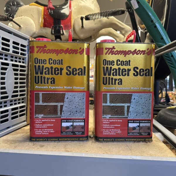 Two tins of Thompson's One Coat Water Seal Ultra wood sealant.