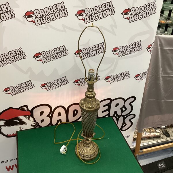 Vintage glass table lamp with twist column and brass base.