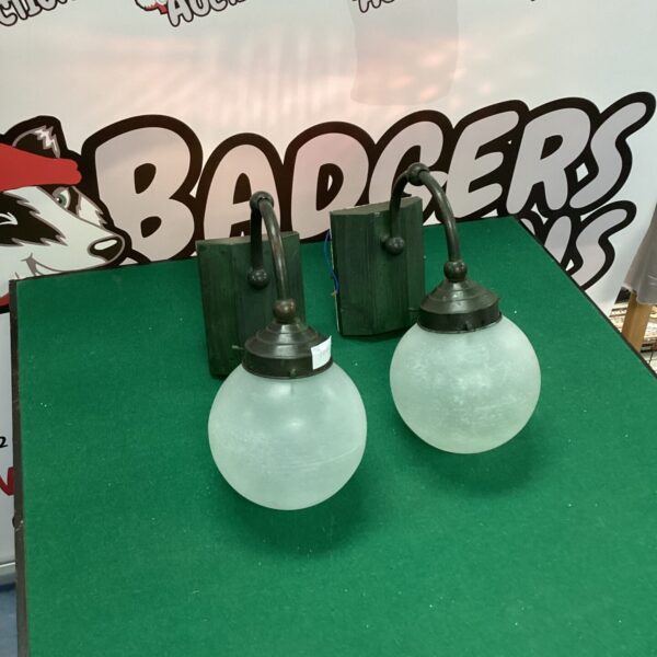 Vintage Christopher Hyde wall lights with frosted glass globes.