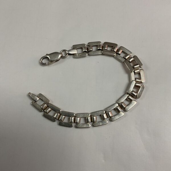 Stylish 925 silver bracelet with interconnected rectangular links.