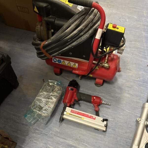 Clarke Bandit air compressor kit with nailer and nails.