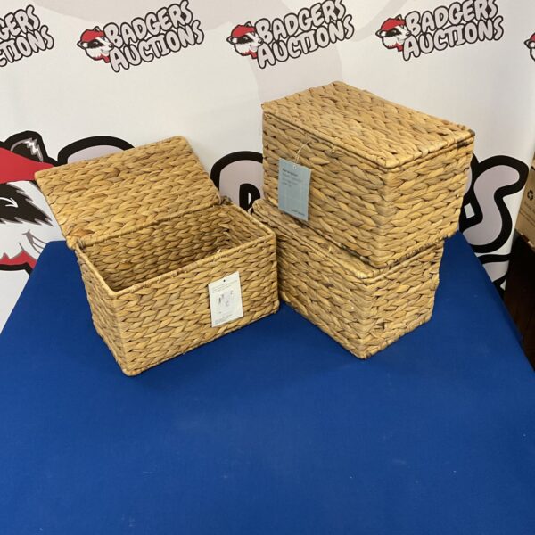 Three woven wicker storage boxes from John Lewis for home organisation.