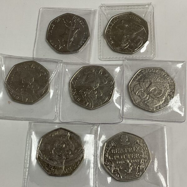 Lot of seven Beatrix Potter 50p coins for collectors.