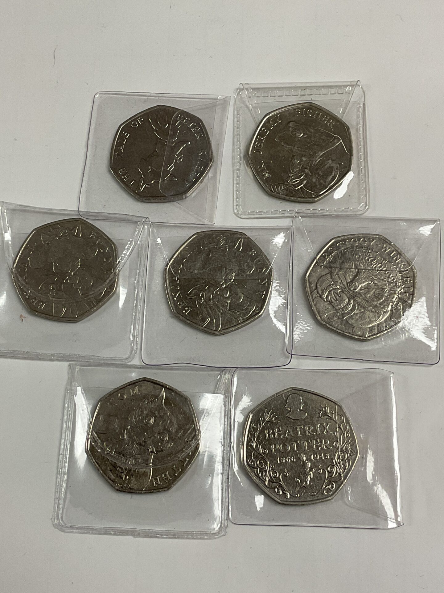 784 Seven Beatrix Potter 50p Coins Inc Jeremy Fisher,Ton Kitten Mrs Tiggy Winkle