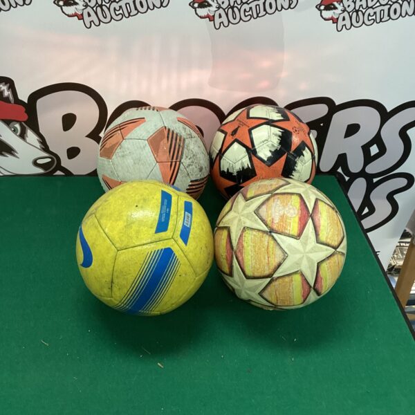 Mixed lot of four footballs including Adidas brand.