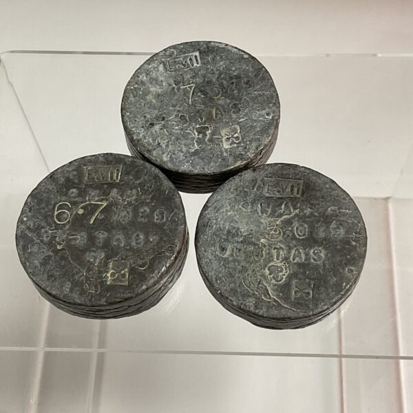 Antique Edward VII lead customs weights for scale accuracy.