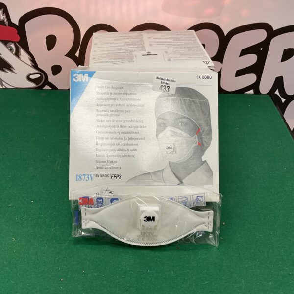 Three boxes of unopened 3M disposable face masks for respiratory protection.