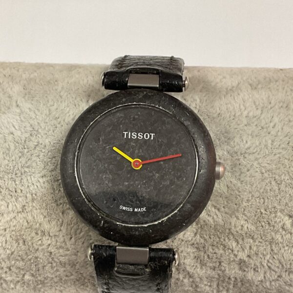 Close-up of vintage Tissot Rock watch with textured dial.