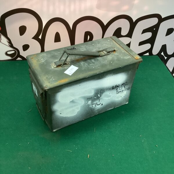 Vintage small metal ammunition tin for storage.