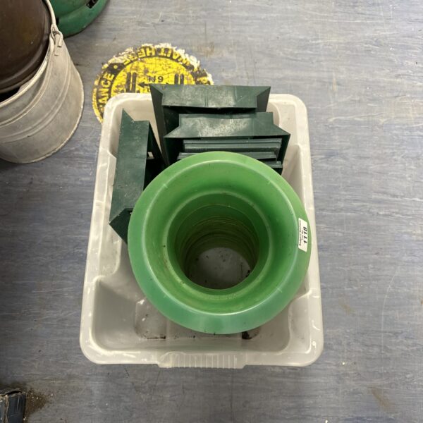 Terracotta garden pots with integrated slug trays for plant protection.