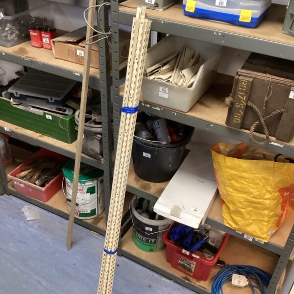 Metal shelf brackets for garage storage and DIY projects.