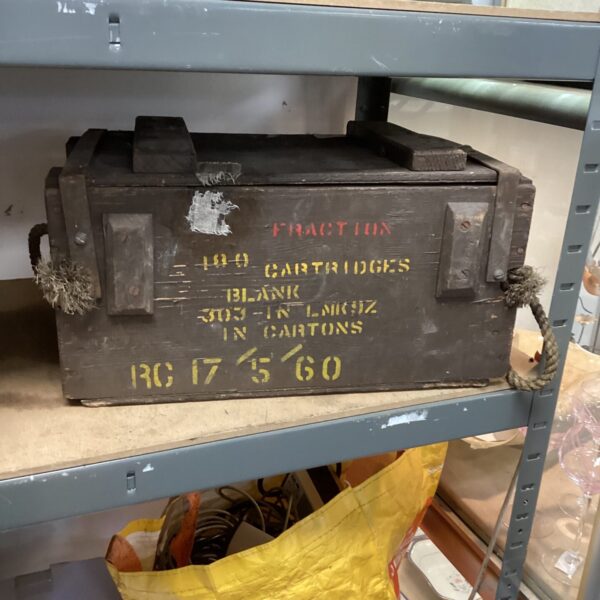 Vintage wooden ammunition case for .303 British cartridges.