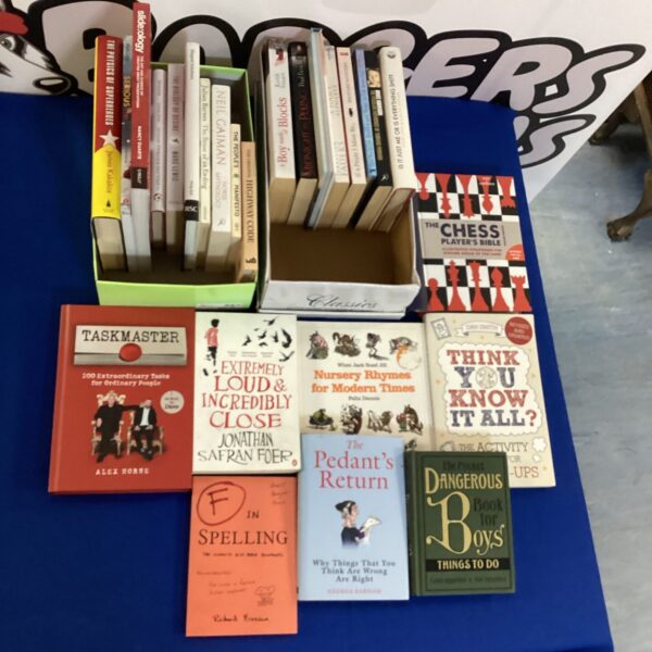 Mixed book lot including Taskmaster titles for collectors.