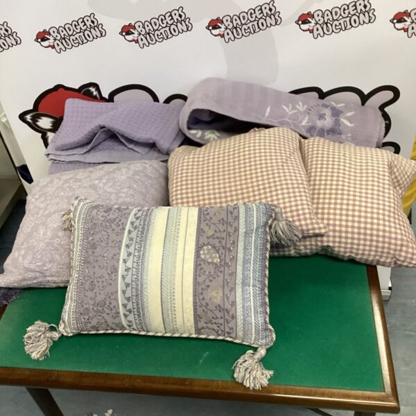 Floral cushion and throw set for home decor.