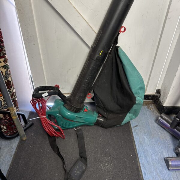 Bosch ALS 2500 garden vacuum with harness and collection bag.