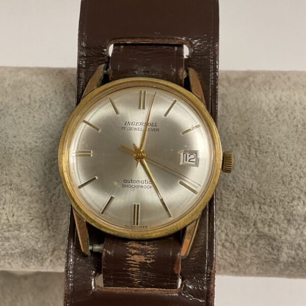 Vintage Ingersoll automatic watch with date window.
