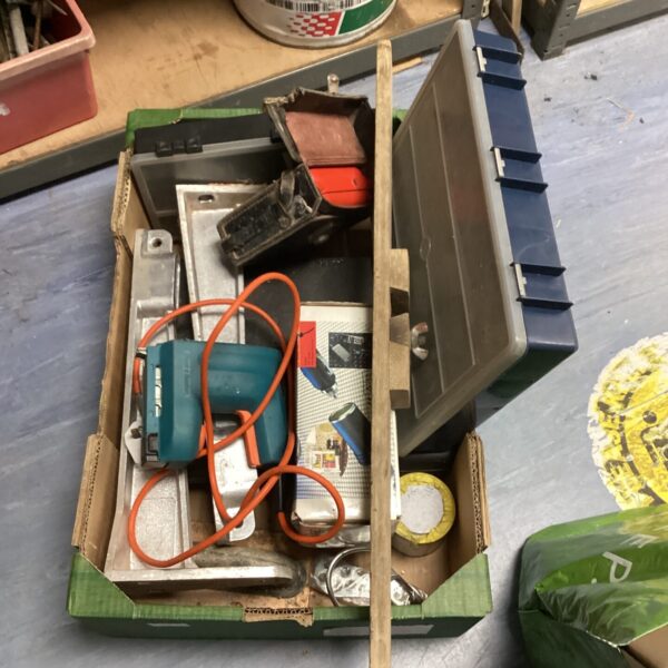 Mixed lot of tools including a Black and Decker stapler.
