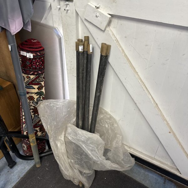 Lot of used drain rod extensions for plumbing.